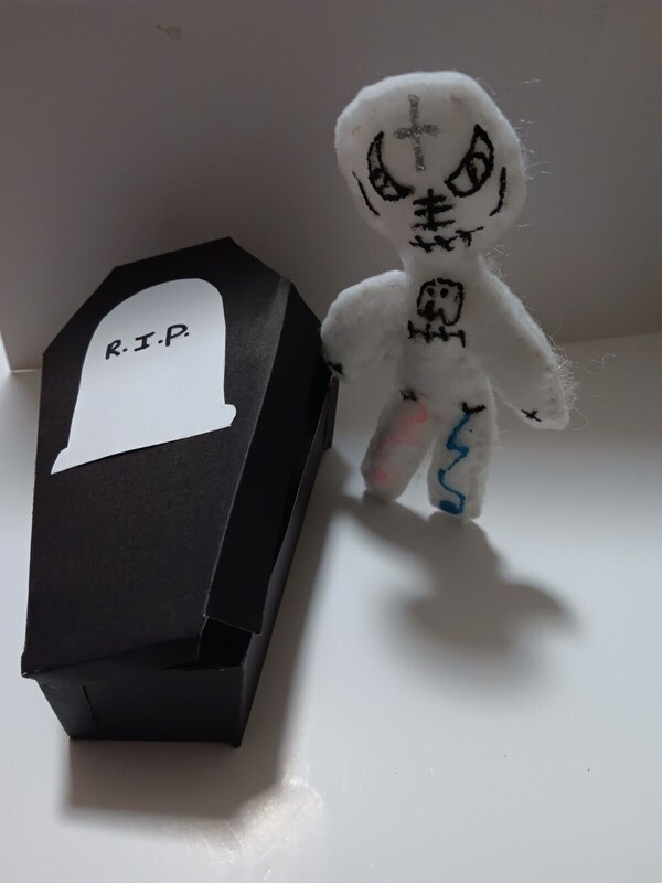 Voodoo Doll Poppet in a Coffin  Be aware Doll Will Bite